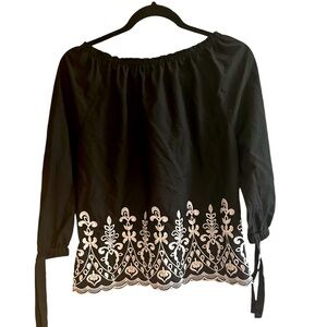 Time and True black top with embroidered details. Size M (8-10).